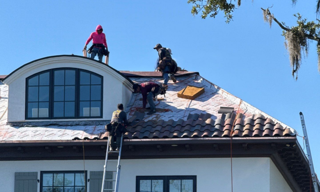 Atacama Roofing crew completing a tile roof replacement on a home in St. Simons Island, Georgia.